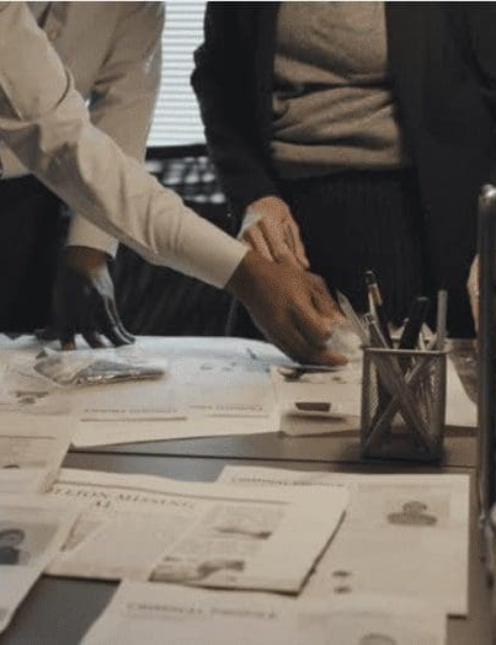 Local Private Detectives looking at paperwork for a case